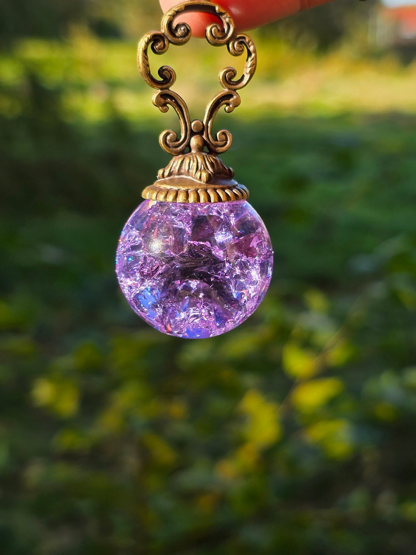 Suncatcher Pendant with Crackled Quartz and Antique Metal Design