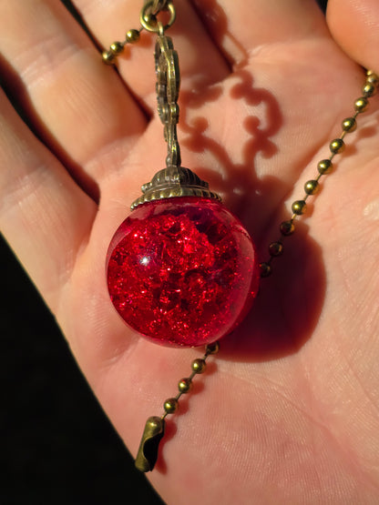 Suncatcher Pendant with Crackled Quartz and Antique Metal Design