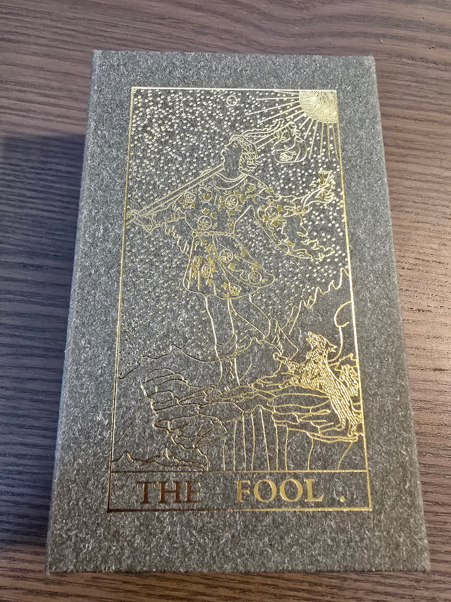 Elegant Tarot cards with golden foil in a beautiful box