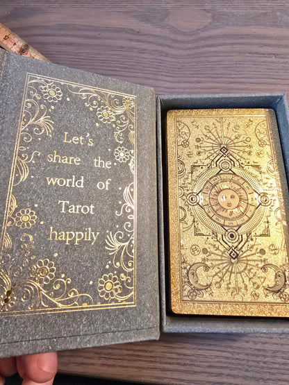 Elegant Tarot cards with golden foil in a beautiful box