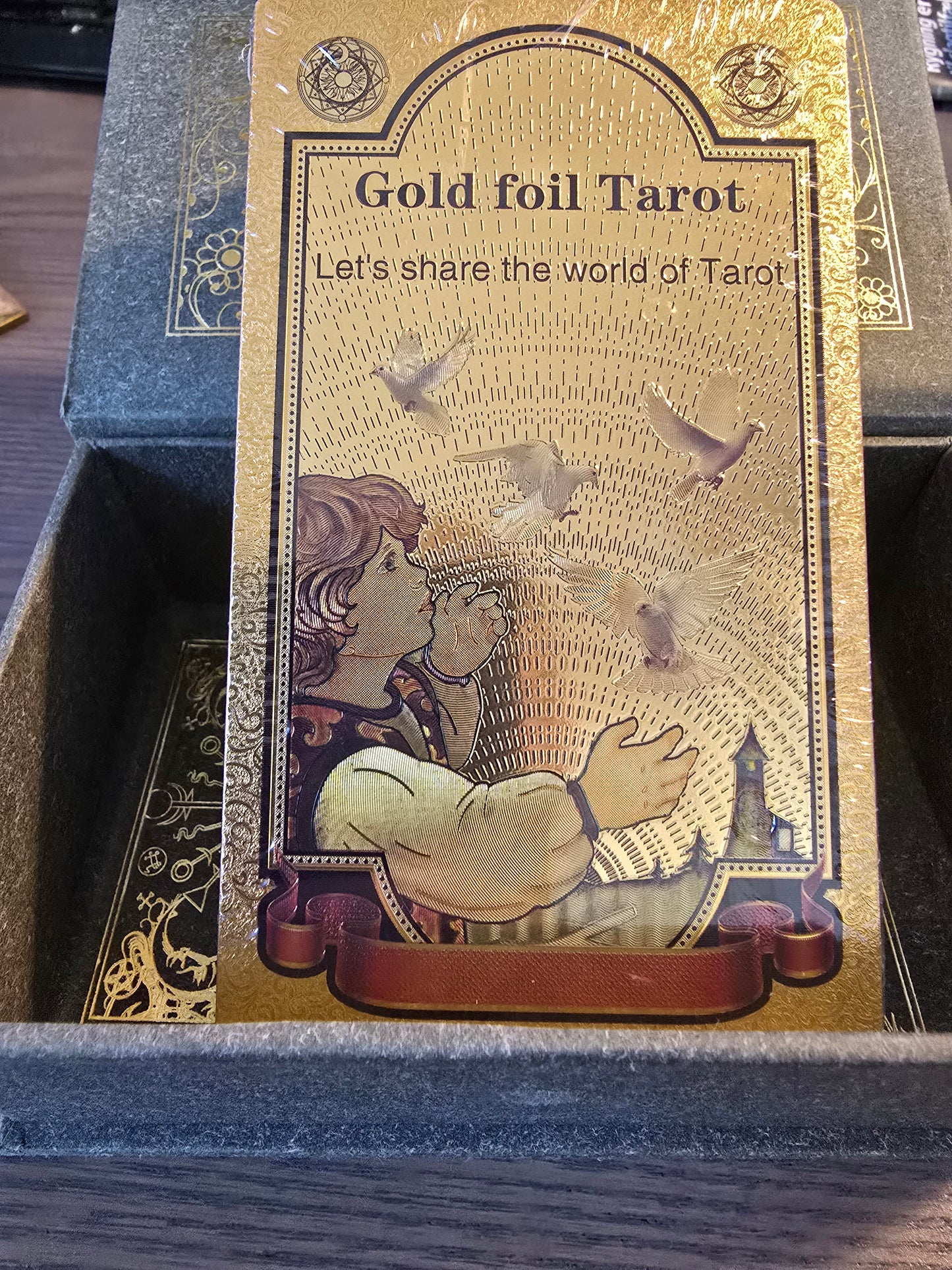 Elegant Tarot cards with golden foil in a beautiful box